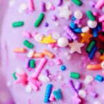 Sugary donut close-up with sprinkles